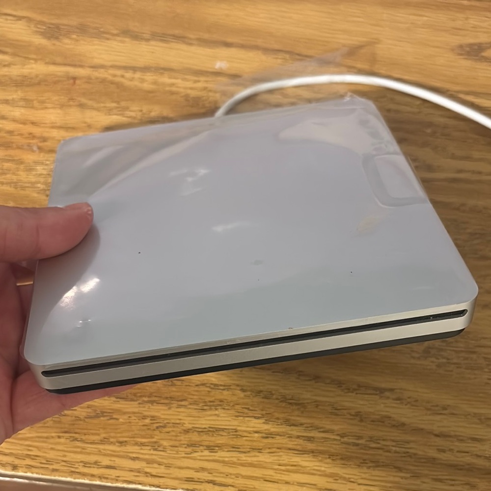 White Electronic Device with Cable